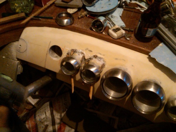 IMG00630-20110501-2201.jpg (613.24 KiB) Viewed 435506 times A hole next to right gauge shows, that the symetry was disturbed.